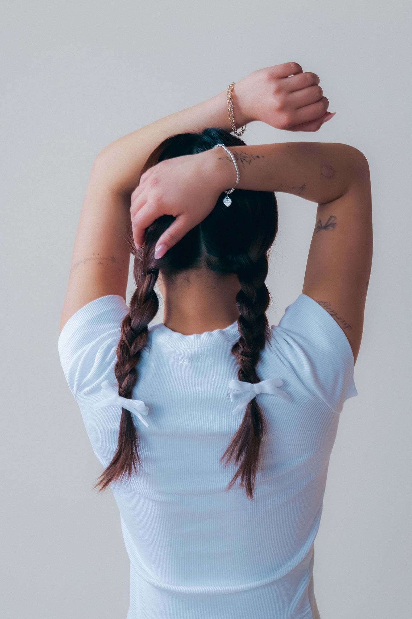 braids with little bow clips